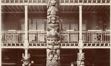 Interior view of the Pitt Rivers Museum, looking towards the east end of the Court, showing the Haida totem pole.