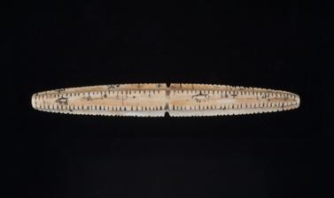 Tangiwun (or tangivun), Evenki calendar made of mammoth tusk ivory, Siberia.
