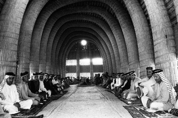 Interior of mudhif (guesthouse), Iraq, by Wilfred Thesiger, 1958. PRM 2004.130.23229.