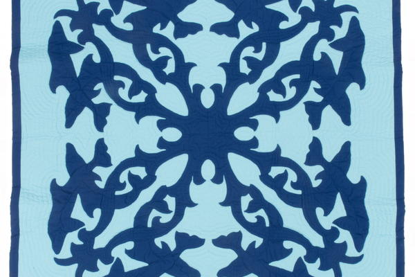 Blue Hawaiian quilt with dolphin design