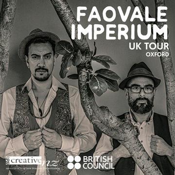 Faovale Imperium - Oxford Performance 2024 Two people stood next to a trees branches, staring straight ahead, their hands holding onto the front of the waistcoats they are wearing.