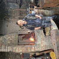 Portrait of Emilia (Ems) Orving in the forge at Tooley's Boatyard, Banbury Portrait of Emilia (Ems) Orving in the forge at Tooley's Boatyard, Banbury